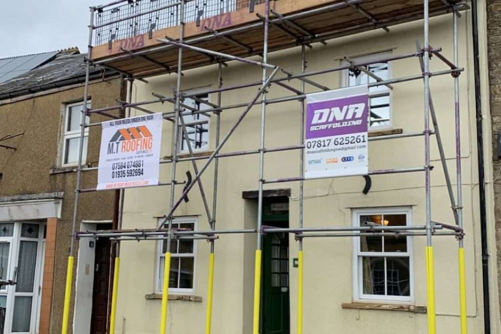 Scaffolding On Old Terraced House For Roof Repair